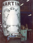 martini BOTTLE BEING PAINTED